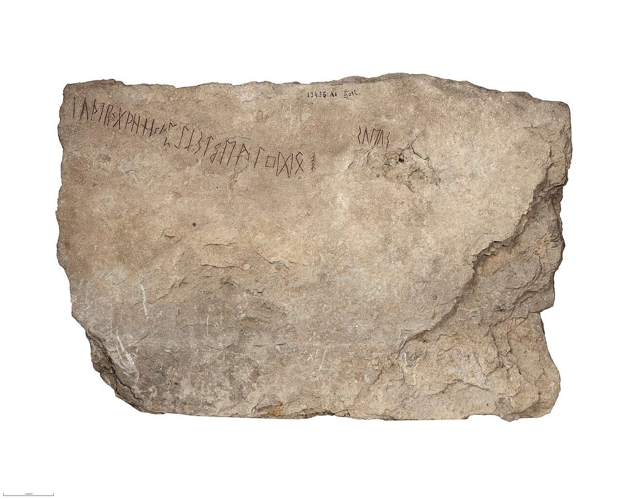 The Kylver stone: a limestone slab with a row of 24 runes cut along its upper edge