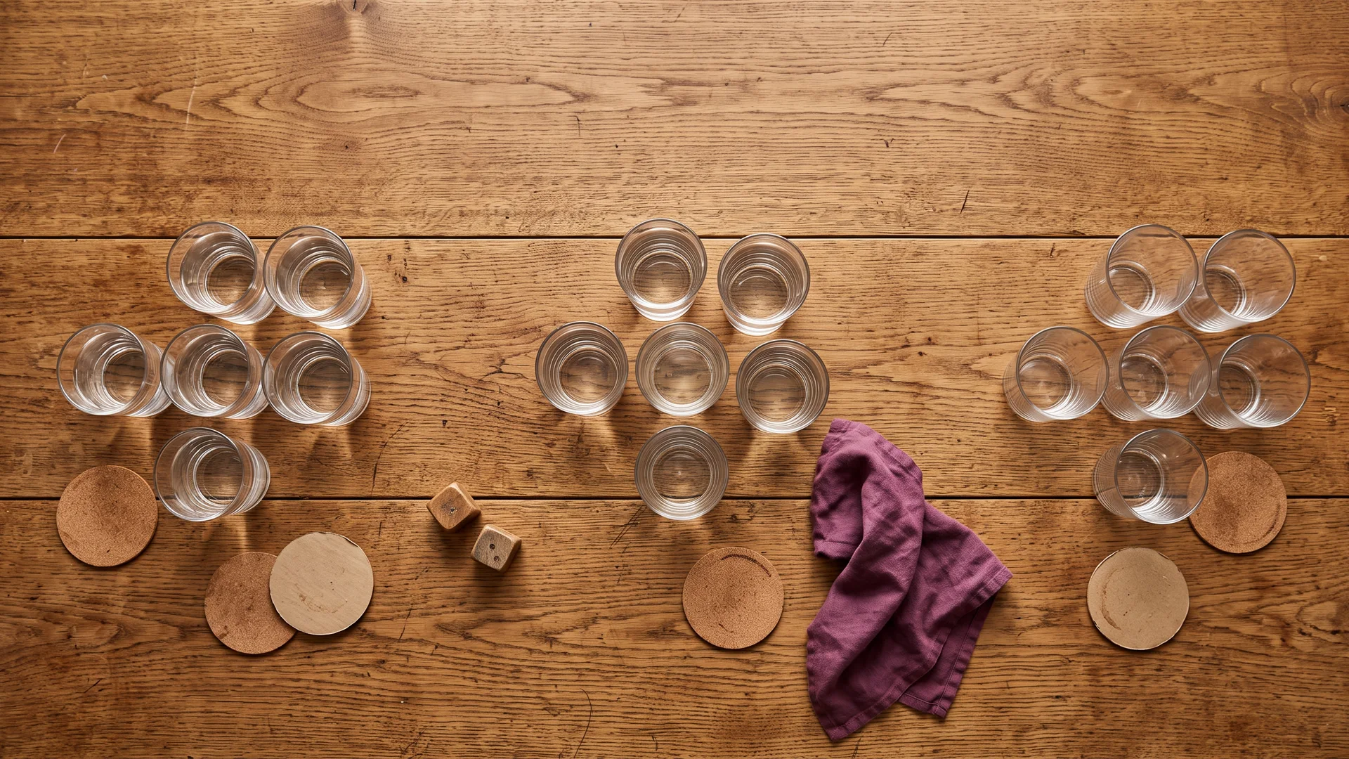 Water and other drinks set out on a table for an adult game night